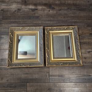 2 intricate wood framed mirrors. See damage in pictures V